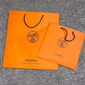 Authentic Hermès shopping tote bags set of two.